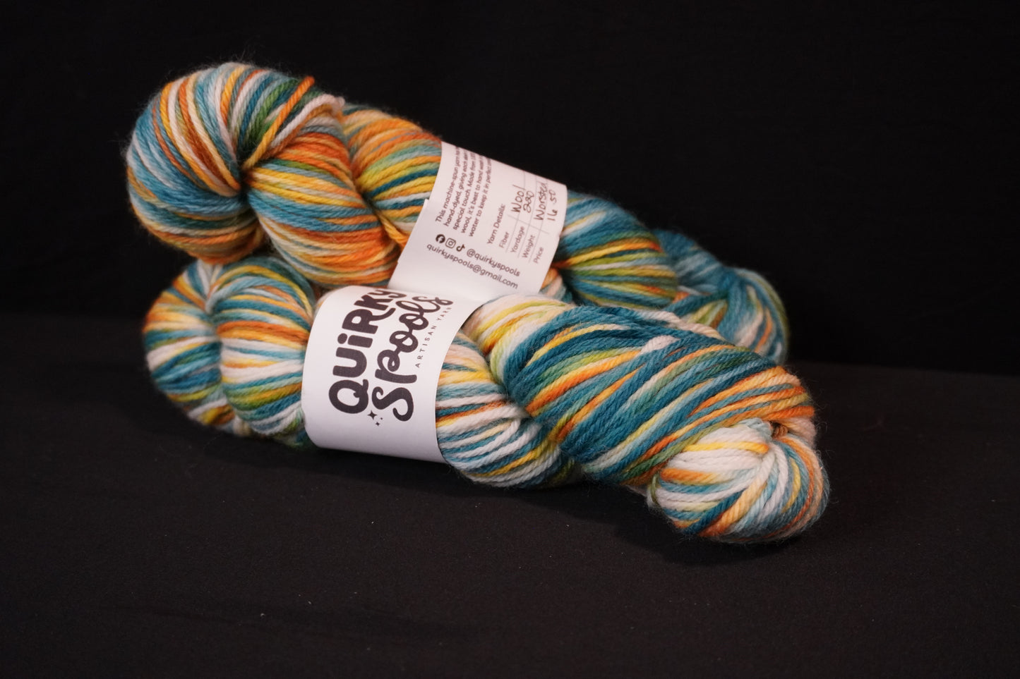 Worsted Teal gold and white yarn