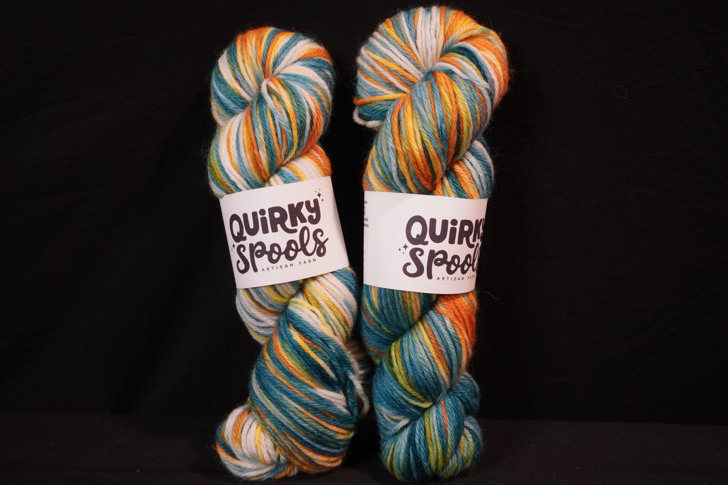 Worsted Teal gold and white yarn