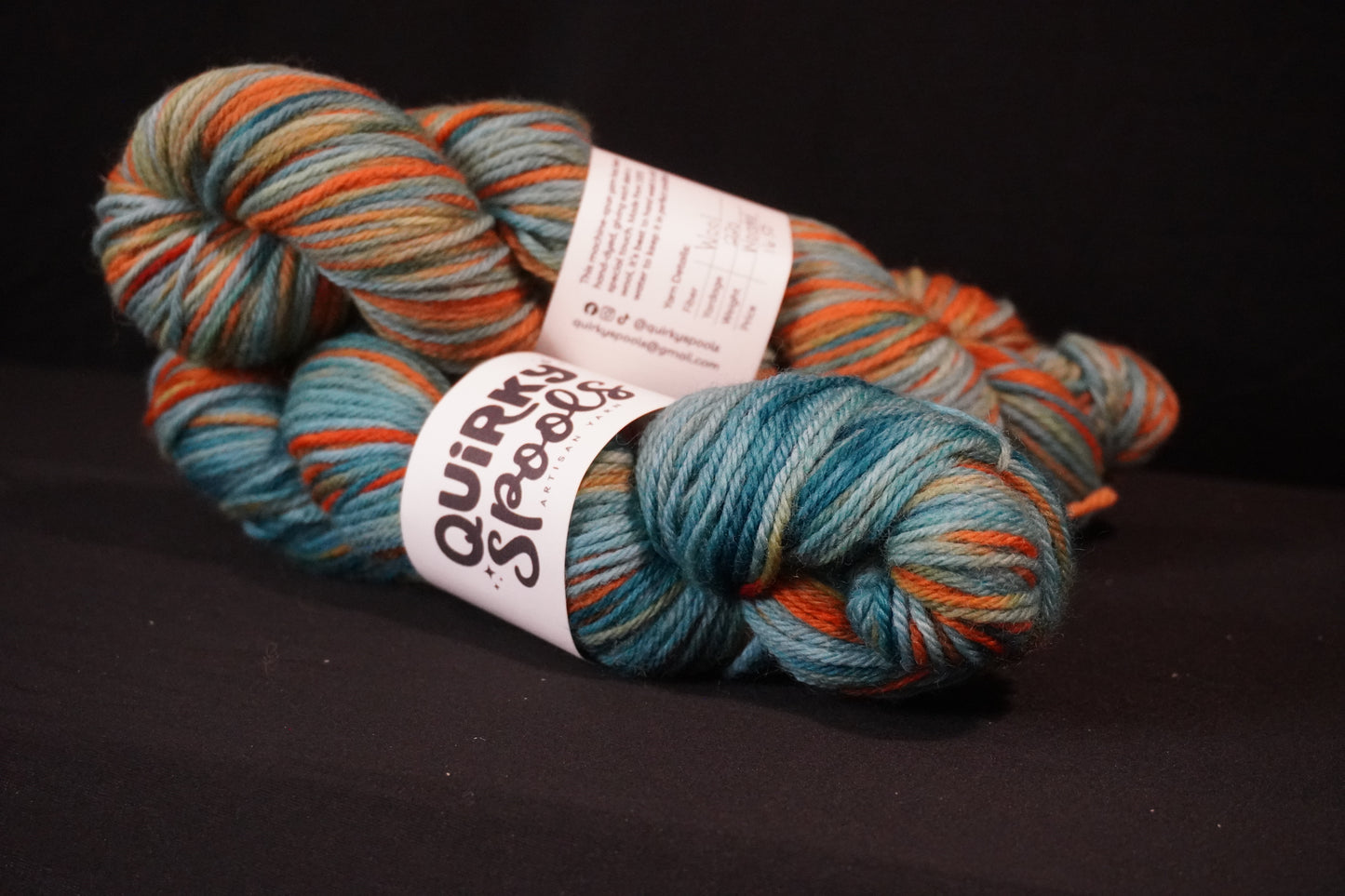 Worsted Teal and Gold yarn